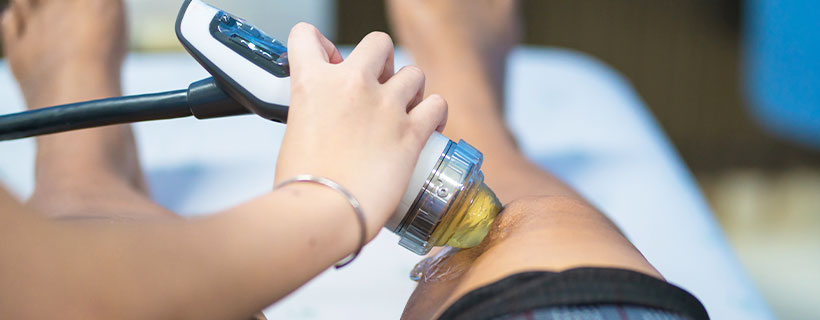 patient receiving shockwave therapy in Fort Worth for auto accident injury pain relief